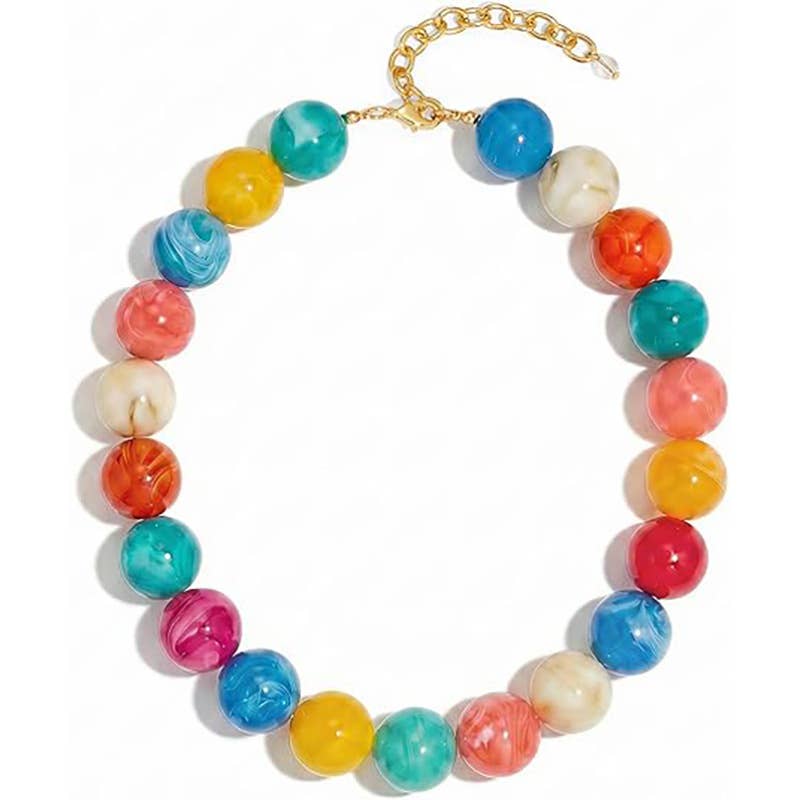 Colorful beaded necklace with a gold chain on a white background