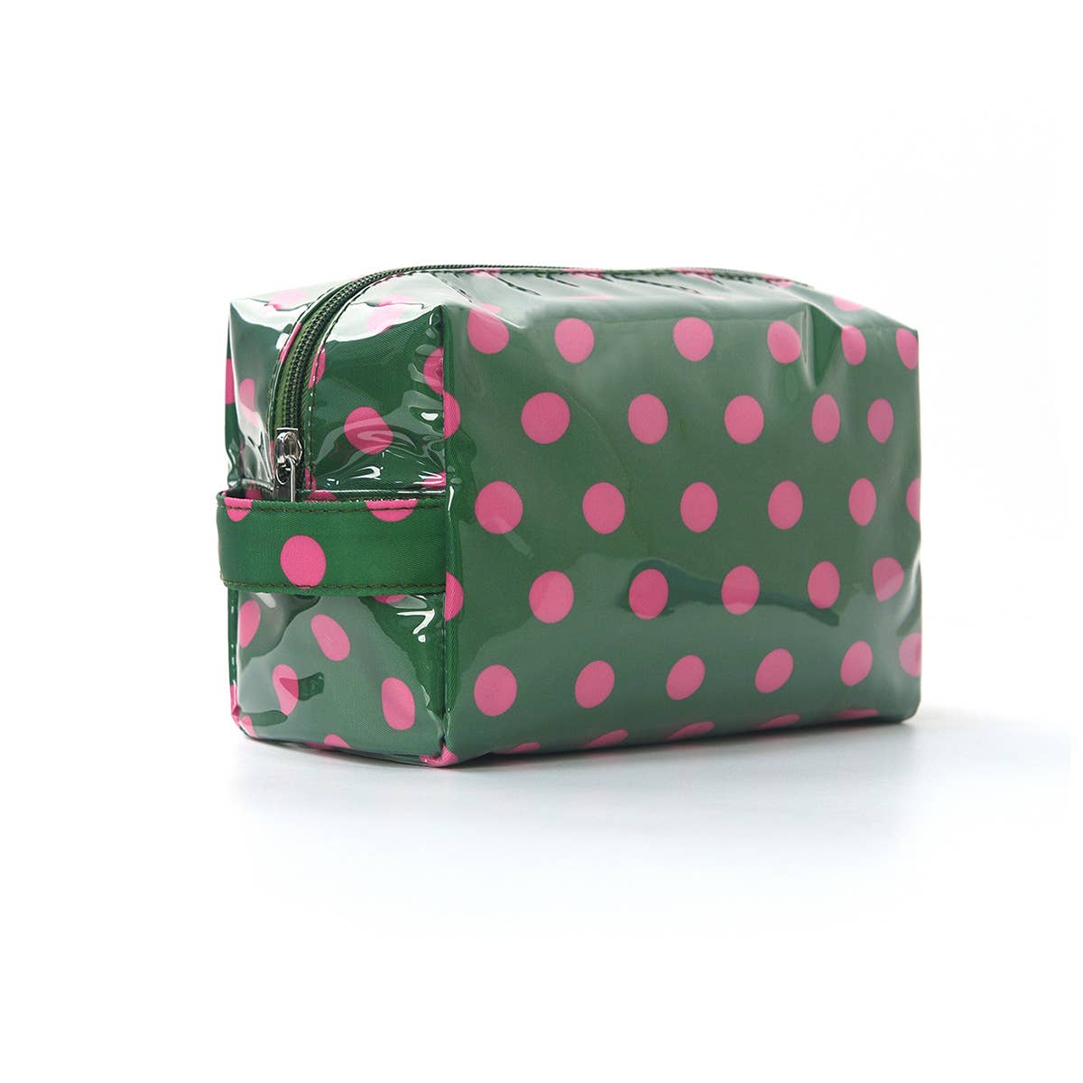 Green cosmetic bag with pink polka dots on a white background