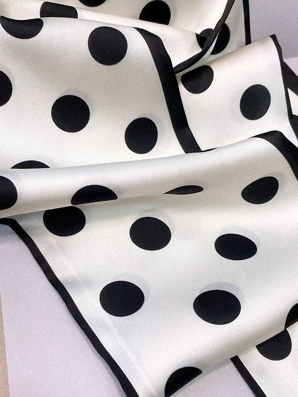 Close-up of a black and white polka dot fabric