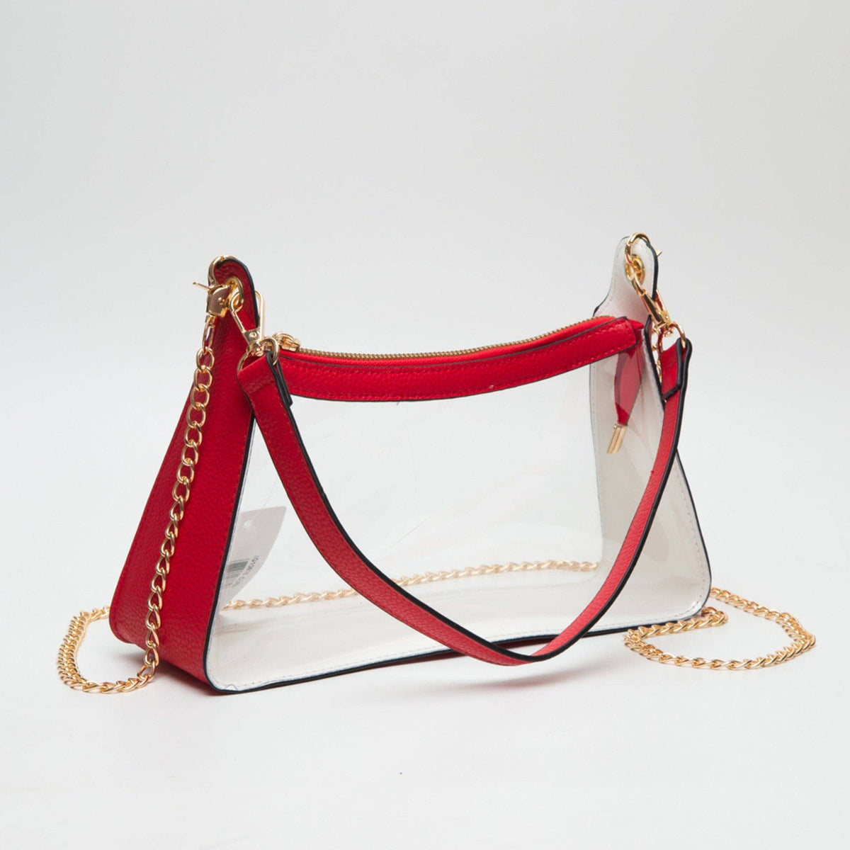 Red and white handbag with gold chain on a light gray background