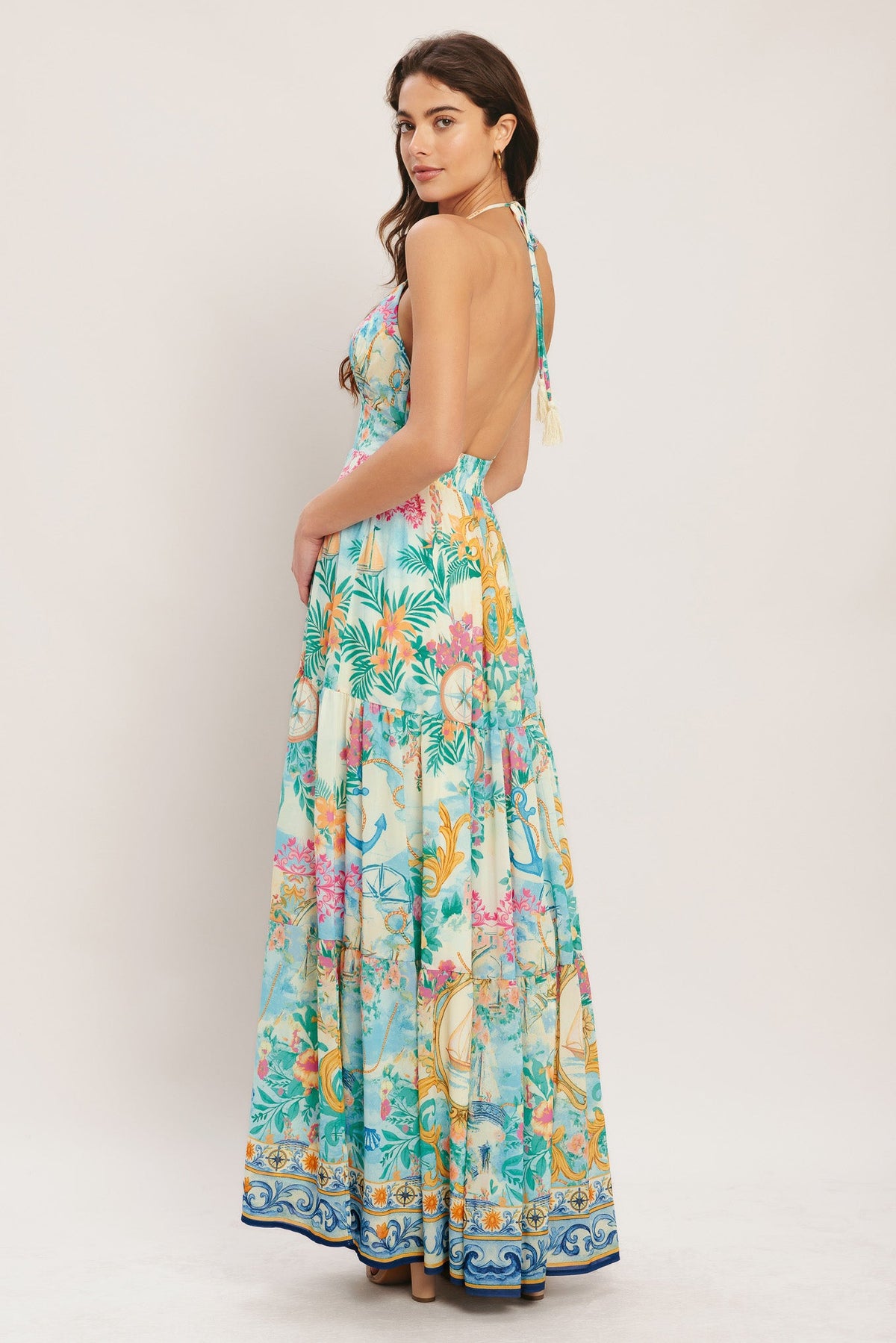 Woman wearing a floral dress on a white background
