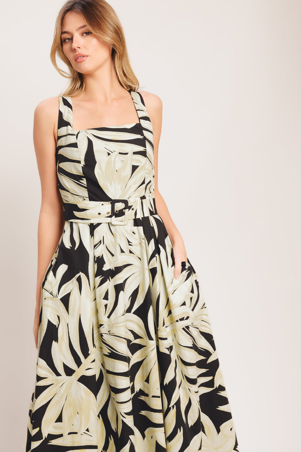 woman wearing leaf printed dress
