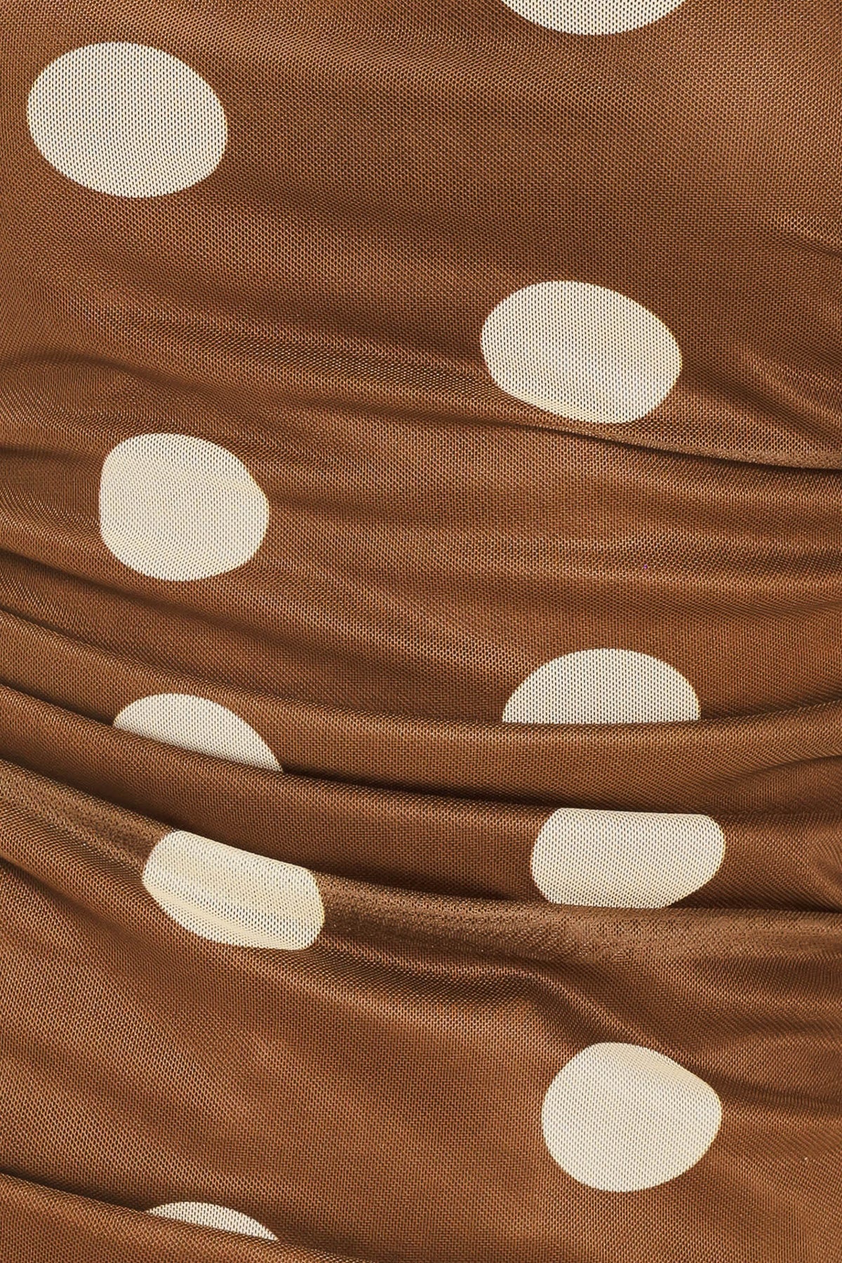 Brown fabric with white polka dots