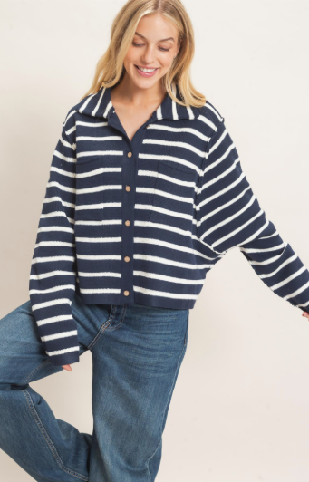 model wearing a striped navy and white cardigan