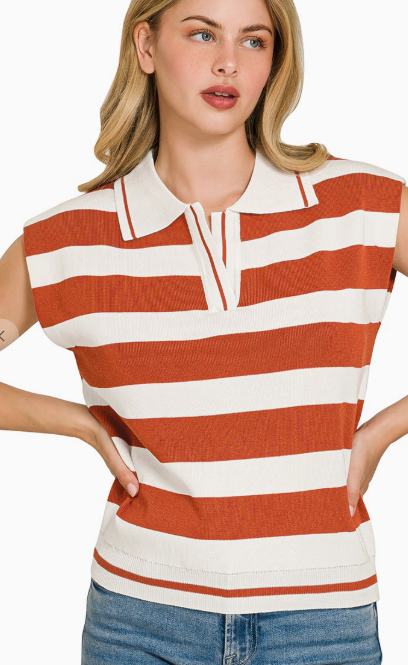 Woman wearing a red and white striped sleeveless polo shirt with a plain background