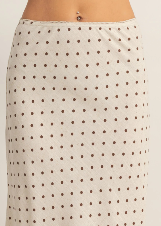 Beige skirt with brown polka dots on a white background