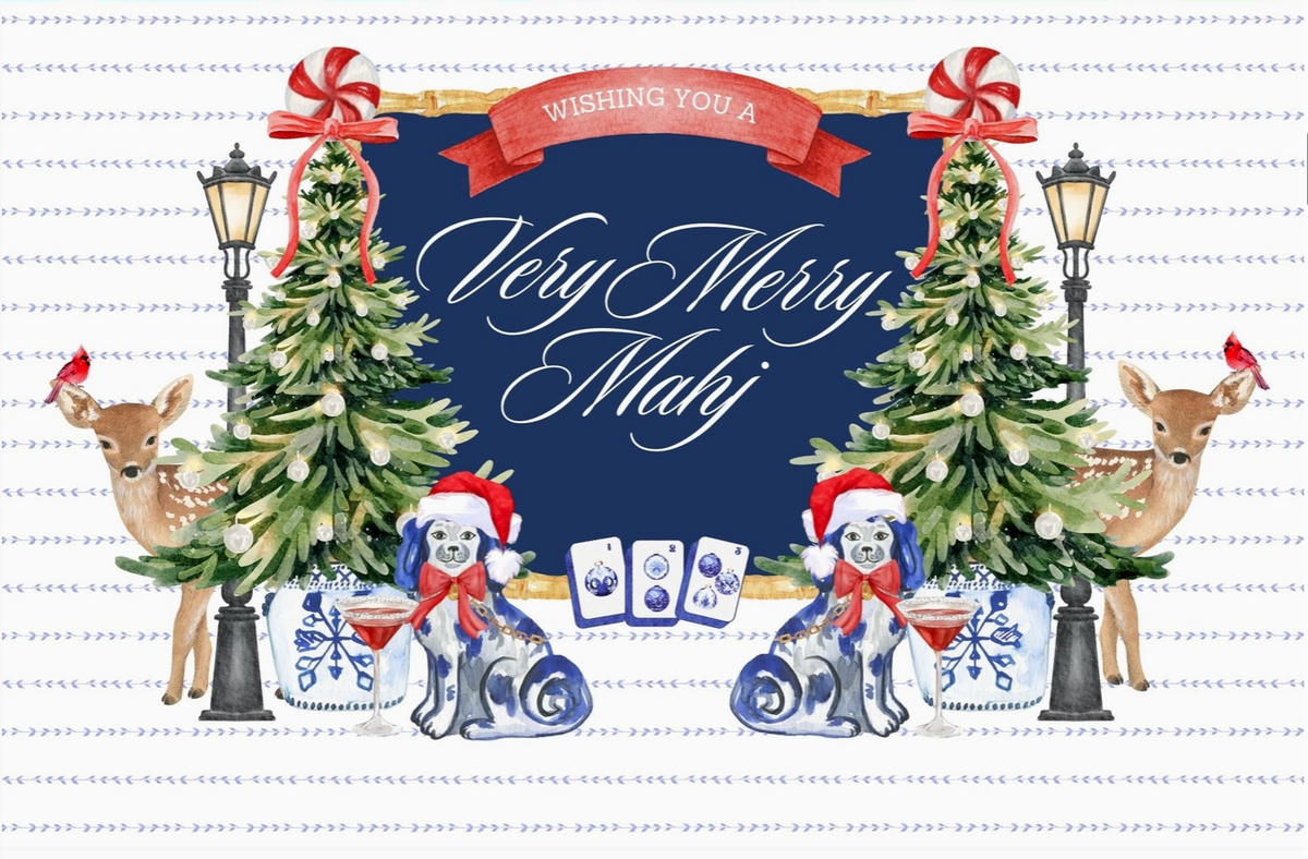 A festive Christmas greeting card design with the text 'Wishing You A Very Merry Mahj' in white script on a dark blue banner. The card features watercolor illustrations of two decorated Christmas trees, two deer wearing Santa hats, two blue-and-white patterned stockings, and two black street lamps, all arranged on a white background with a light blue wavy stripe pattern.