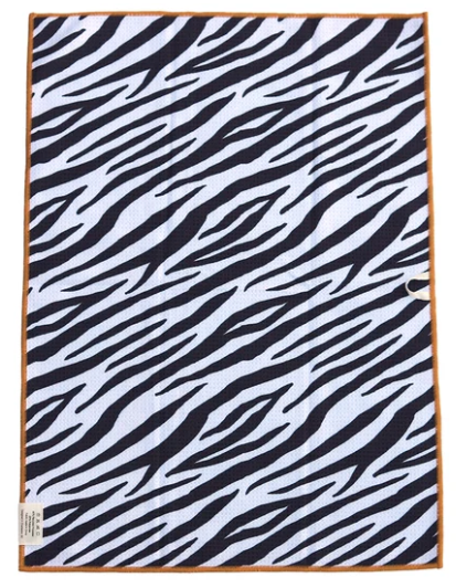 A square scarf featuring a bold black and white zebra stripe pattern, finished with a thin orange border.