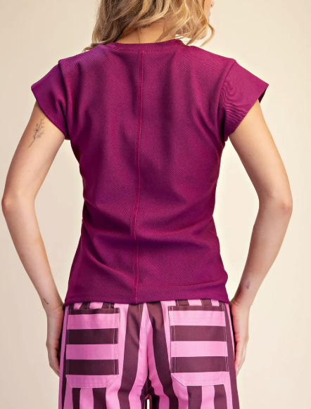 model wearing a short sleeved top