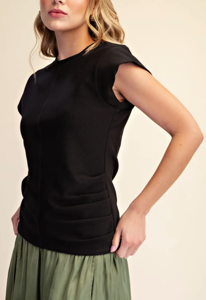 model wearing a short sleeved top