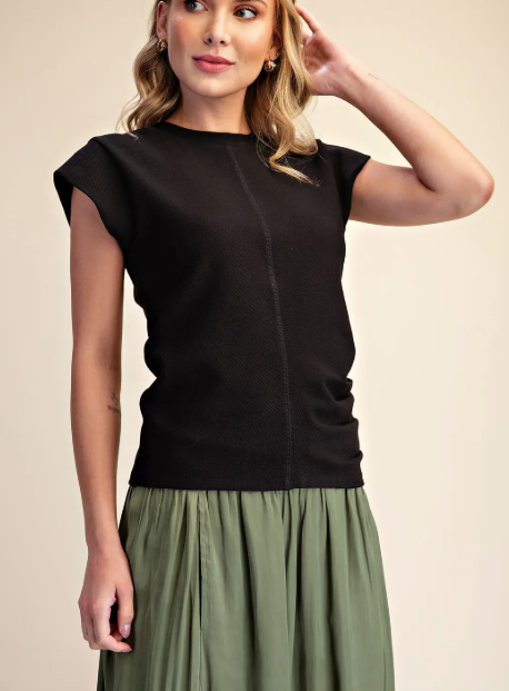 model wearing a short sleeved top