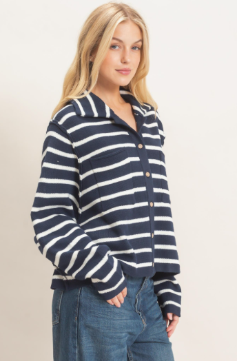 model wearing a striped navy and white cardigan
