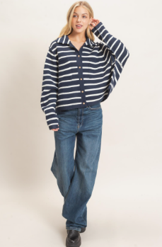 model wearing a striped navy and white cardigan