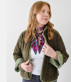 woman wearing a velvet reversible jacket