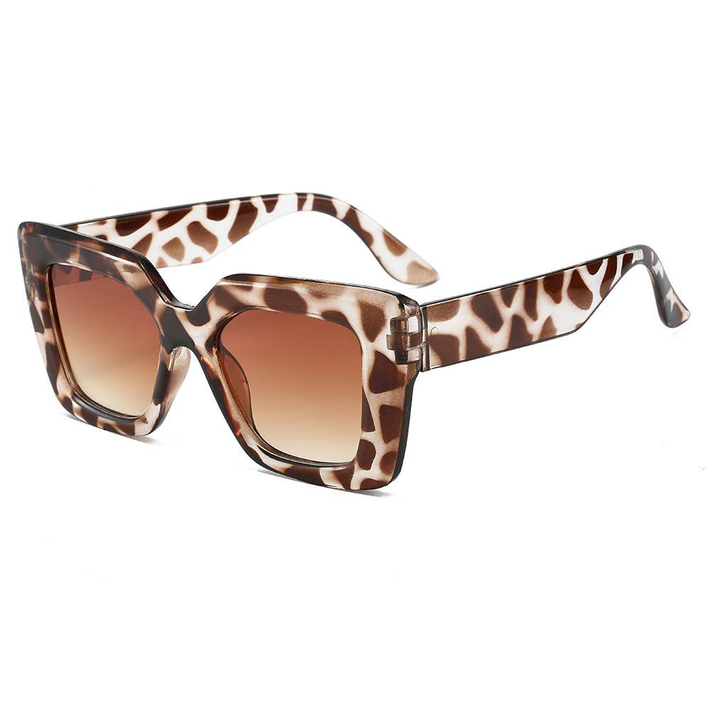 Sunglasses with leopard print frame and brown lenses on a white background